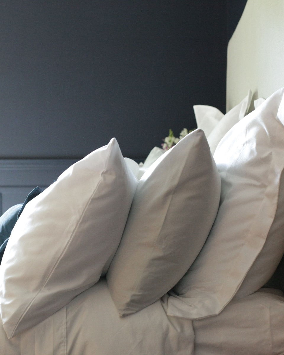 Fall 2022 Bedding Buying Guide pillows on bed