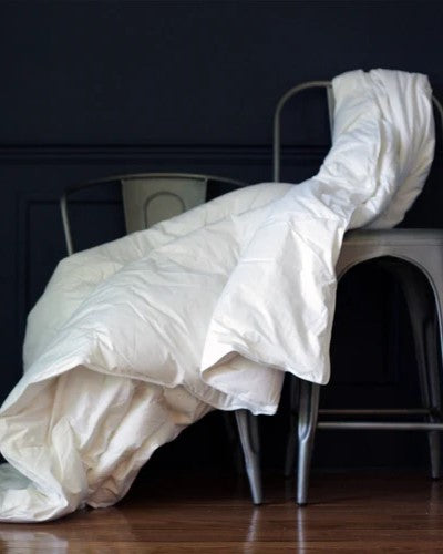 The Advantages of Sleeping Under a Down Comforter