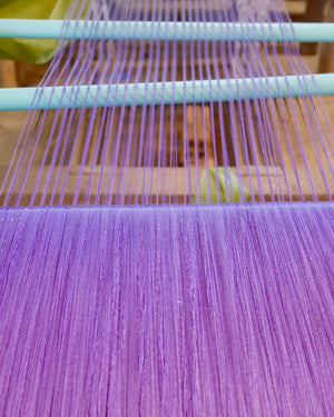 purple silk on loom