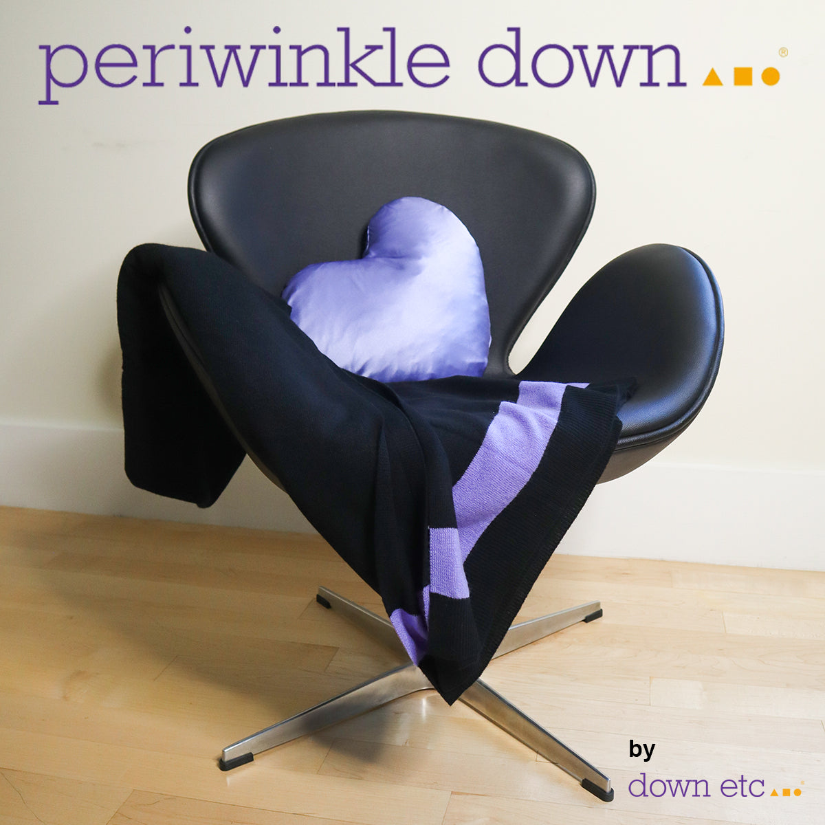 periwinkle heart pillow in chair