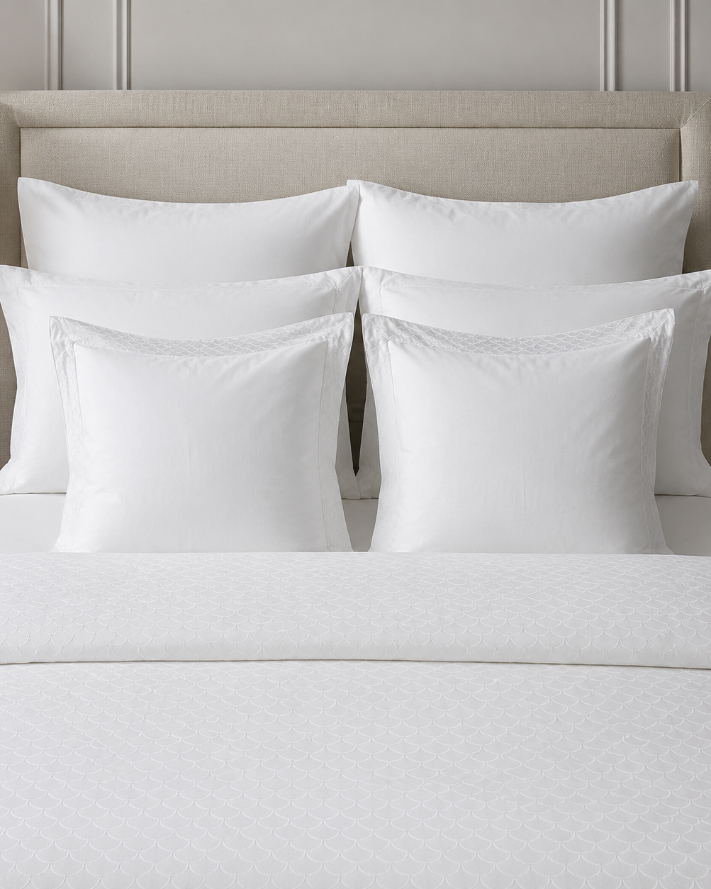 6 pillows on a bed