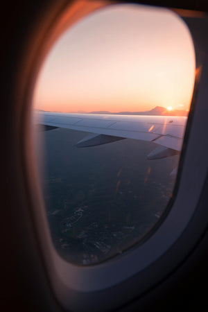 sunrise out of plane window