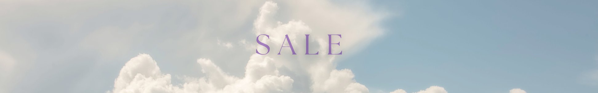 SALE over white fluffy clouds