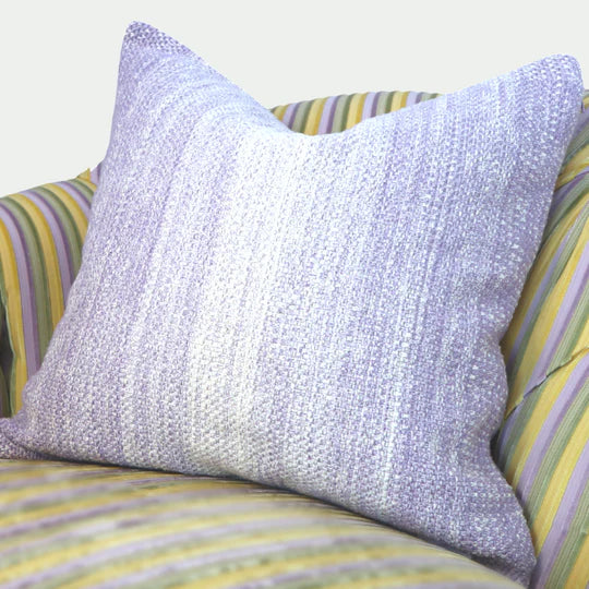 purple knitted throw and throw pillow set