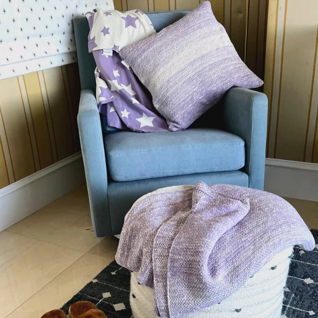 purple knitted throw and throw pillow set