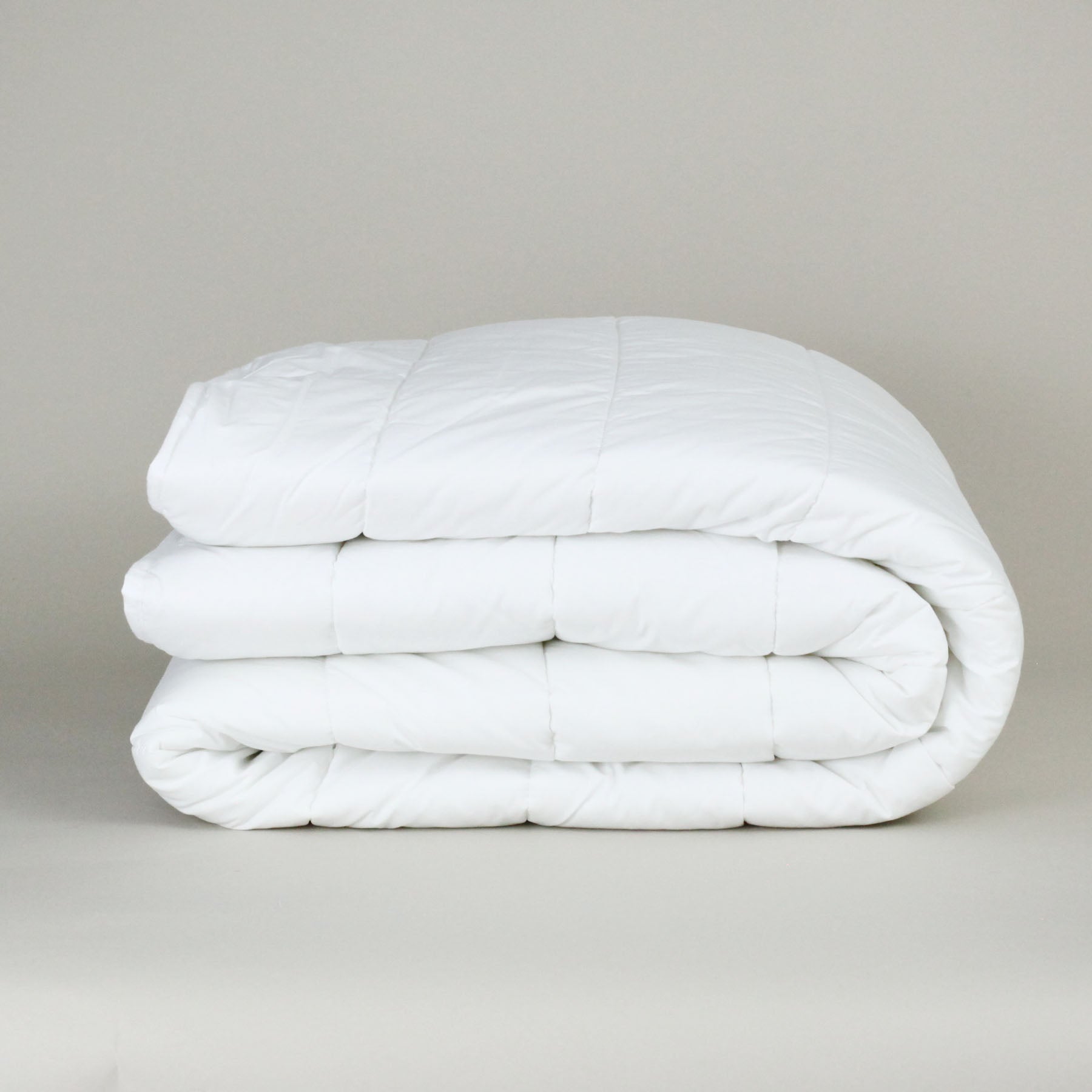 Essential_Quilted_Fitted_Crib_Mattress_Pad_Down-etc