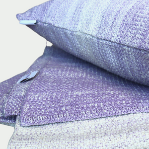 purple knitted throw pillow